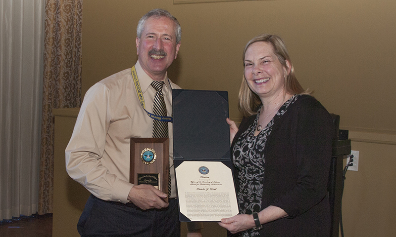 DOD's Comptroller Recognizes NPS DRMI Director With Prestigious Award
