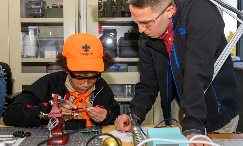 NPS Experts Help Boy Scout Troops Earn STEM-based Merit Badges During Campus Visit
